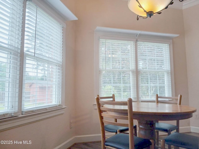 3902 Little John Dr N, Wilson, NC 27896 - dining space featuring baseboards, healthy amount of natural light, and wood finished floors