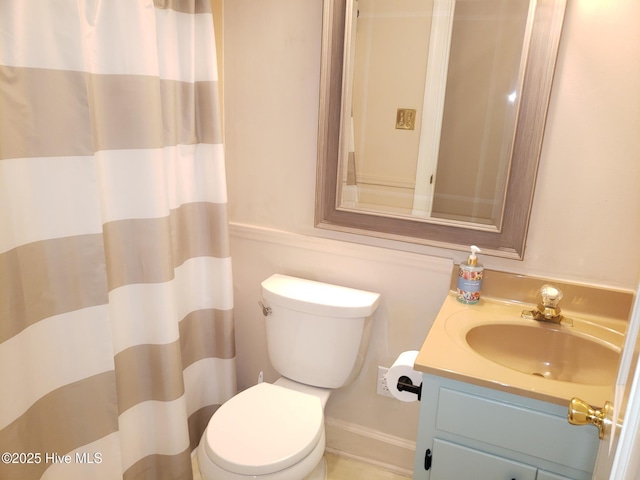 3902 Little John Dr N, Wilson, NC 27896 - bathroom featuring vanity, toilet, and a shower with curtain