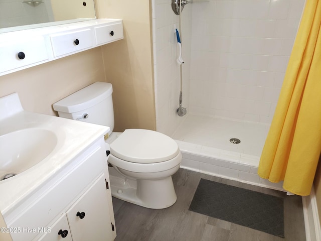 3902 Little John Dr N, Wilson, NC 27896 - full bath featuring toilet, a shower stall, vanity, and wood finished floors