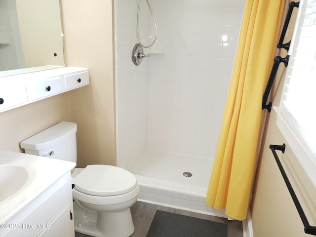 3902 Little John Dr N, Wilson, NC 27896 - full bathroom featuring a shower stall, toilet, and vanity