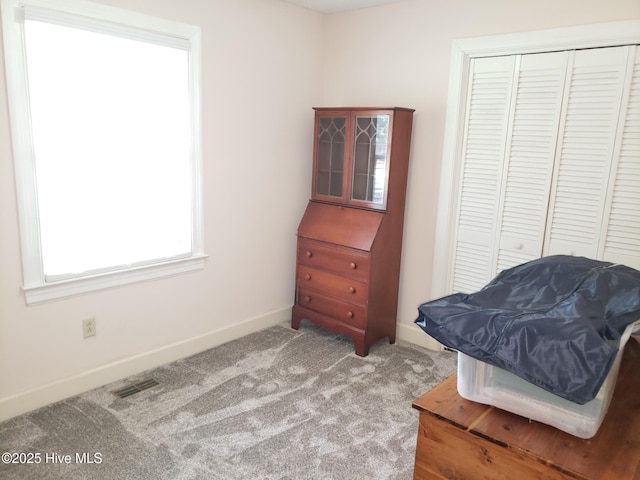 3902 Little John Dr N, Wilson, NC 27896 - living area featuring carpet and baseboards