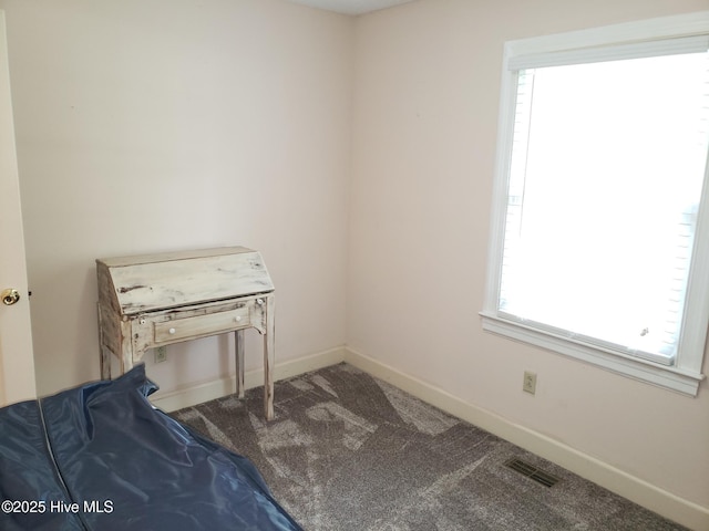 3902 Little John Dr N, Wilson, NC 27896 - bedroom with baseboards and carpet