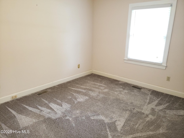 3902 Little John Dr N, Wilson, NC 27896 - carpeted empty room featuring baseboards