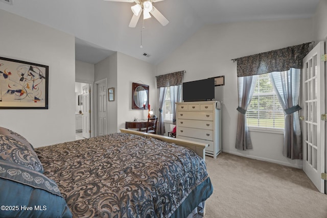 120 Leyland Way, Hampstead, NC 28443 - bedroom featuring carpet floors, lofted ceiling, ensuite bath, baseboards, and ceiling fan