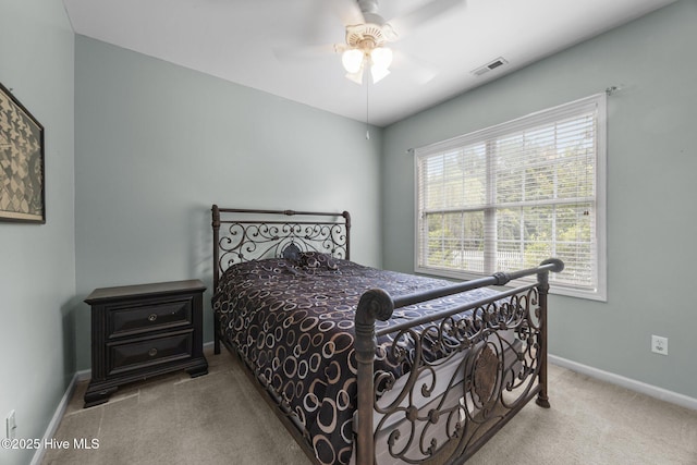 120 Leyland Way, Hampstead, NC 28443 - carpeted bedroom with baseboards and a ceiling fan