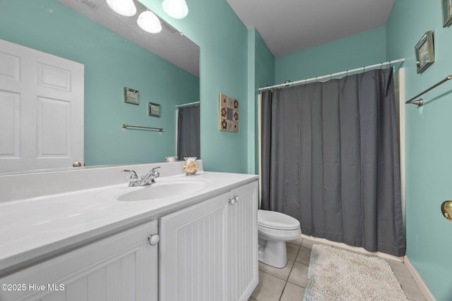 120 Leyland Way, Hampstead, NC 28443 - bathroom with toilet, vanity, tile patterned flooring, and curtained shower