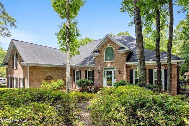 1501 Meridian Ter, Wilmington, NC 28411 - view of front of home with brick siding, roof with shingles, and a garage