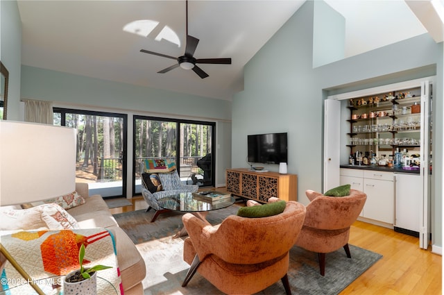185 Ponte Vedra Dr, Pinehurst, NC 28374 - living room with a bar, high vaulted ceiling, light wood-style flooring, and ceiling fan