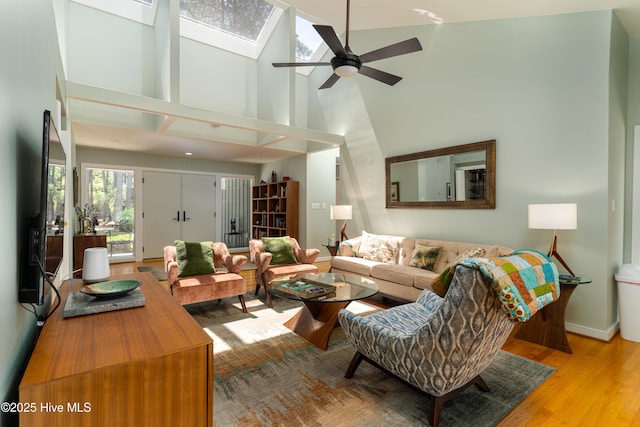 185 Ponte Vedra Dr, Pinehurst, NC 28374 - living area with high vaulted ceiling, wood finished floors, and ceiling fan