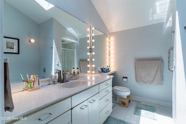 185 Ponte Vedra Dr, Pinehurst, NC 28374 - bathroom featuring vanity, lofted ceiling, a shower with shower door, tile patterned floors, and a skylight