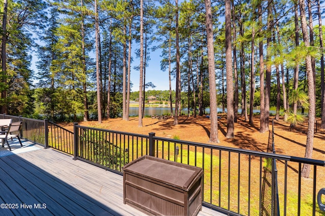 185 Ponte Vedra Dr, Pinehurst, NC 28374 - wooden deck with a water view, view of wooded area, and outdoor dining area