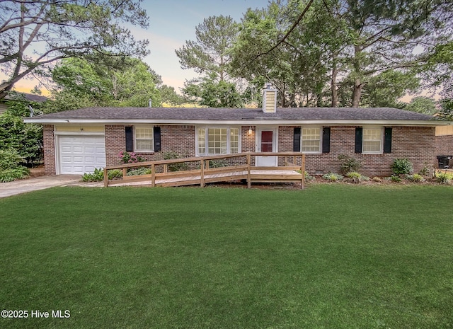 1710 Aydlett Cir, Elizabeth City, NC 27909 - ranch-style house with a garage, brick siding, a front yard, concrete driveway, and a chimney