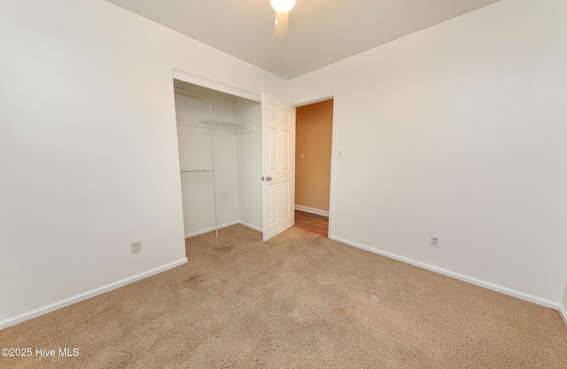 1710 Aydlett Cir, Elizabeth City, NC 27909 - unfurnished bedroom featuring carpet floors, a closet, baseboards, and ceiling fan