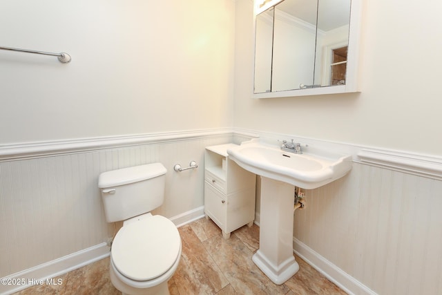 1710 Aydlett Cir, Elizabeth City, NC 27909 - half bathroom with toilet, a wainscoted wall, and ornamental molding