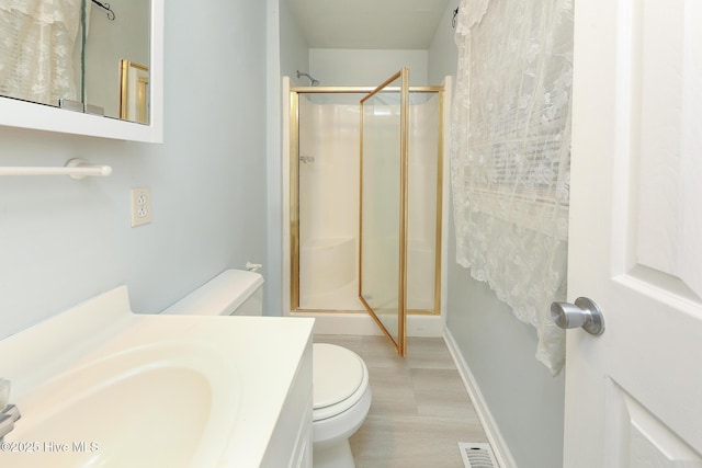 1710 Aydlett Cir, Elizabeth City, NC 27909 - full bathroom featuring toilet, a stall shower, and vanity
