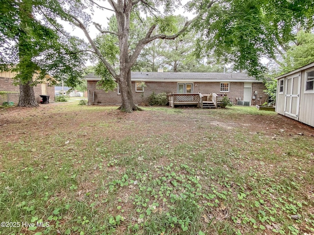 1710 Aydlett Cir, Elizabeth City, NC 27909 - view of yard featuring a wooden deck and central air condition unit