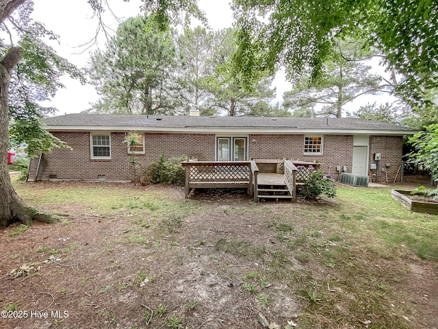1710 Aydlett Cir, Elizabeth City, NC 27909 - back of property featuring crawl space, brick siding, a wooden deck, and central AC unit