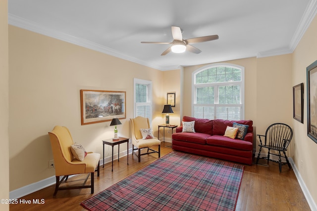 1012 Creekside Ln, Wilmington, NC 28411 - living area featuring a ceiling fan, wood finished floors, baseboards, and ornamental molding