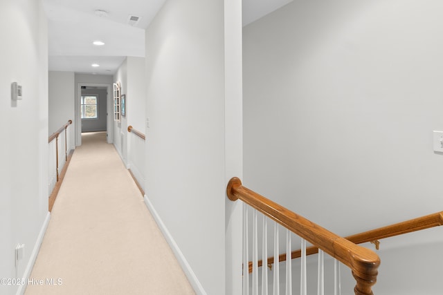 1012 Creekside Ln, Wilmington, NC 28411 - corridor with an upstairs landing, light colored carpet, baseboards, and recessed lighting
