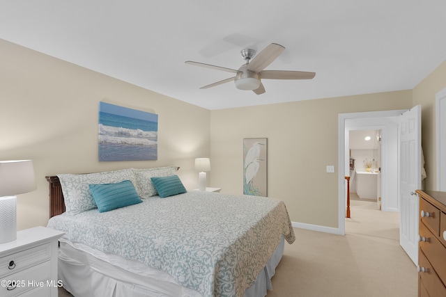 1012 Creekside Ln, Wilmington, NC 28411 - bedroom featuring light carpet, baseboards, and a ceiling fan