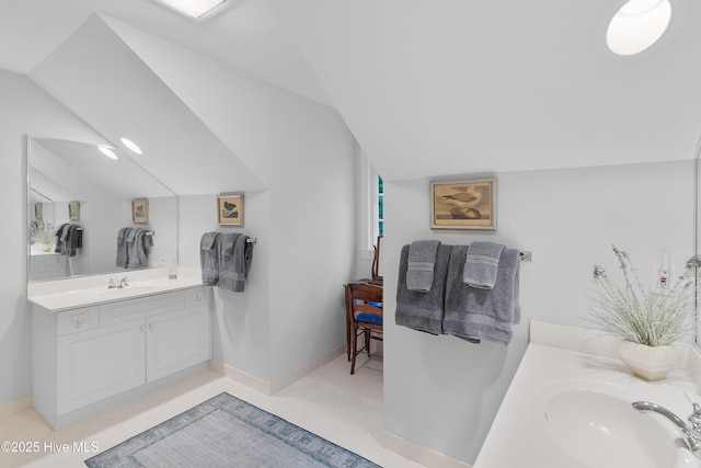 1012 Creekside Ln, Wilmington, NC 28411 - bathroom with vanity, lofted ceiling, baseboards, and tile patterned floors