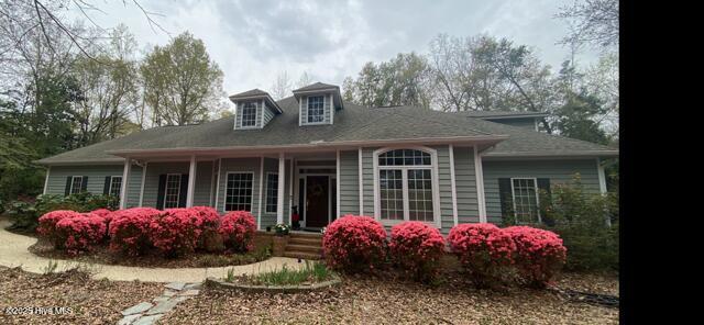1012 Creekside Ln, Wilmington, NC 28411 - view of front facade featuring a porch