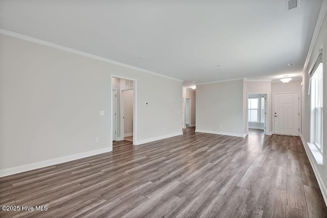 3200 Laughing Gull Ter, Wilmington, NC 28412 - unfurnished living room featuring wood finished floors and crown molding