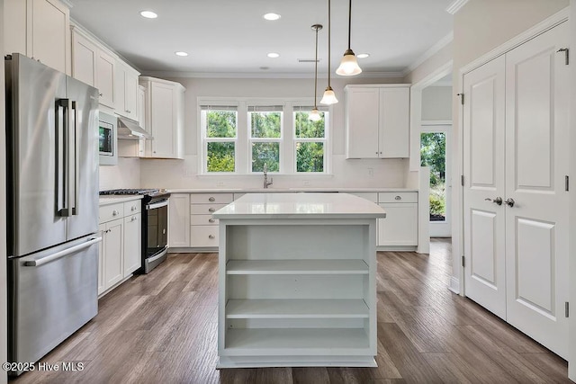 3200 Laughing Gull Ter, Wilmington, NC 28412 - kitchen with appliances with stainless steel finishes, open shelves, plenty of natural light, crown molding, and light countertops