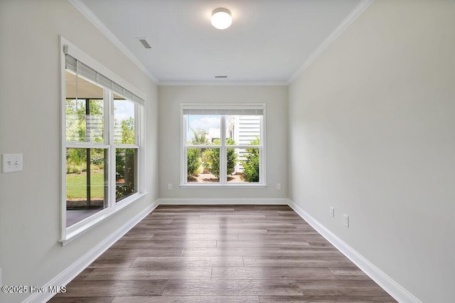 3200 Laughing Gull Ter, Wilmington, NC 28412 - spare room with ornamental molding and wood finished floors