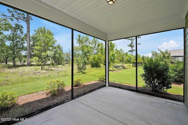 3200 Laughing Gull Ter, Wilmington, NC 28412 - unfurnished sunroom featuring view of scattered trees