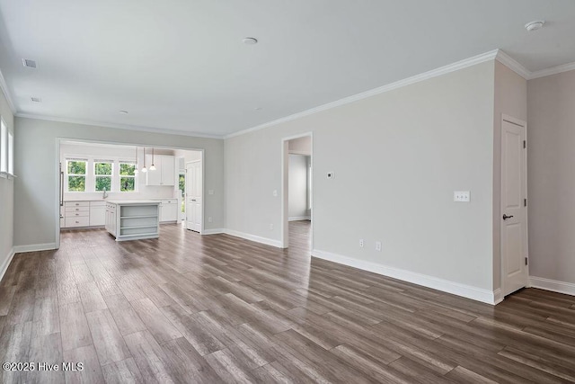 3200 Laughing Gull Ter, Wilmington, NC 28412 - unfurnished living room with wood finished floors and crown molding