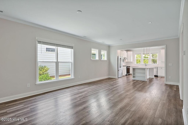 3200 Laughing Gull Ter, Wilmington, NC 28412 - unfurnished living room with ornamental molding, dark wood-style floors, and plenty of natural light
