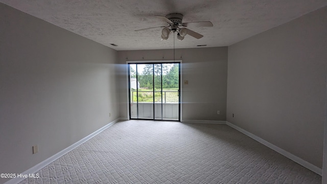 134 Mallards Cv, Vass, NC 28394 - unfurnished room featuring ceiling fan, baseboards, carpet, and a textured ceiling