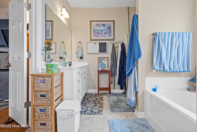 600 Pearson Cir, Newport, NC 28570 - bathroom featuring vanity, a bath, and baseboards