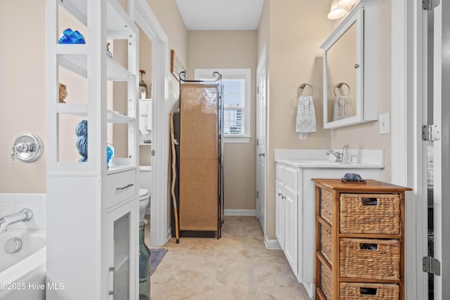 600 Pearson Cir, Newport, NC 28570 - full bath featuring toilet, vanity, and a garden tub