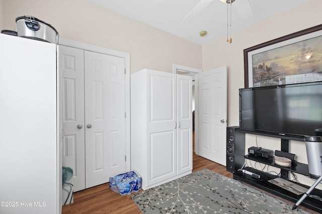 600 Pearson Cir, Newport, NC 28570 - bedroom featuring wood finished floors, a closet, freestanding refrigerator, and ceiling fan