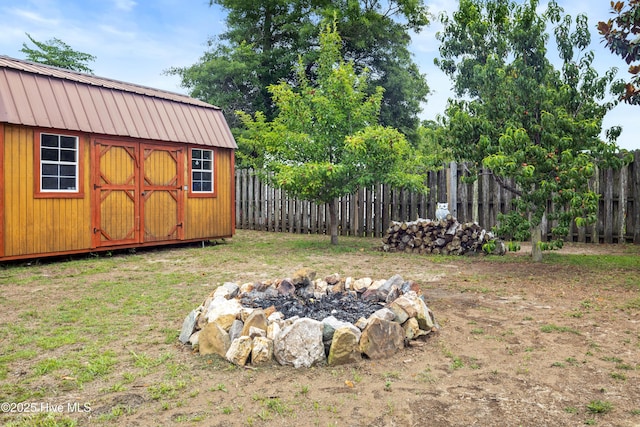 600 Pearson Cir, Newport, NC 28570 - fenced backyard featuring a fire pit
