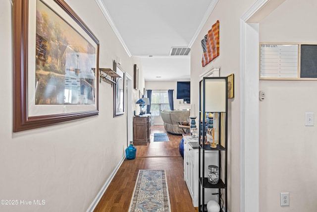 600 Pearson Cir, Newport, NC 28570 - hallway featuring ornamental molding, dark wood-style floors, and baseboards