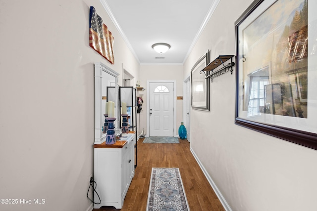 600 Pearson Cir, Newport, NC 28570 - doorway featuring wood finished floors, ornamental molding, and baseboards