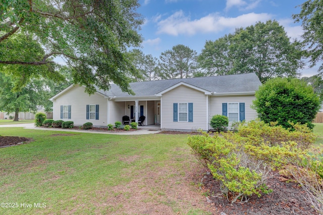 318 Winding Creek Rd, Rocky Point, NC 28457 - single story home with a front lawn