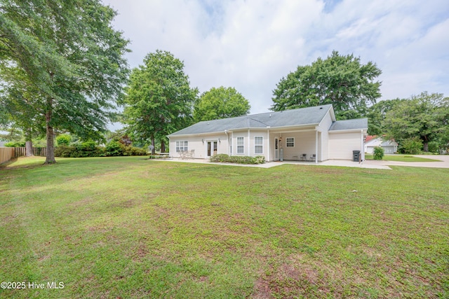318 Winding Creek Rd, Rocky Point, NC 28457 - single story home featuring a carport, driveway, and a patio area