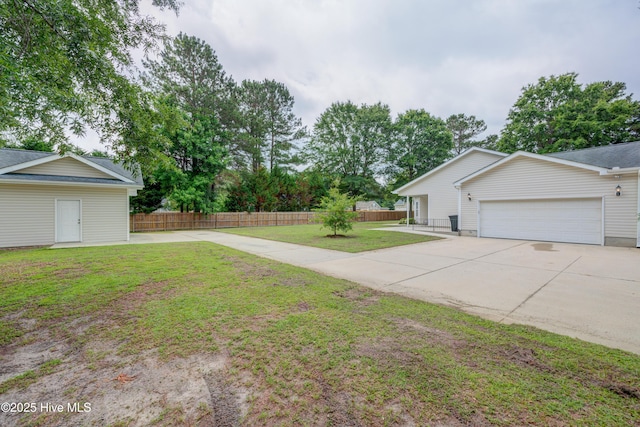 318 Winding Creek Rd, Rocky Point, NC 28457 - view of yard with driveway and a garage