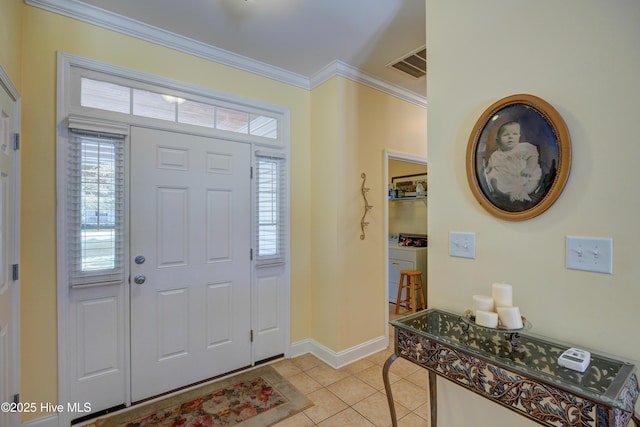 318 Winding Creek Rd, Rocky Point, NC 28457 - foyer featuring ornamental molding, light tile patterned floors, and baseboards