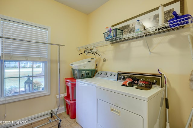 318 Winding Creek Rd, Rocky Point, NC 28457 - laundry area with separate washer and dryer, light tile patterned floors, and baseboards
