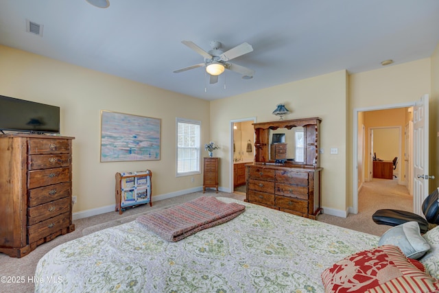 318 Winding Creek Rd, Rocky Point, NC 28457 - bedroom featuring carpet flooring, baseboards, ensuite bathroom, and ceiling fan