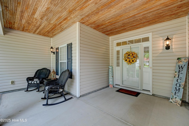318 Winding Creek Rd, Rocky Point, NC 28457 - view of exterior entry featuring a porch