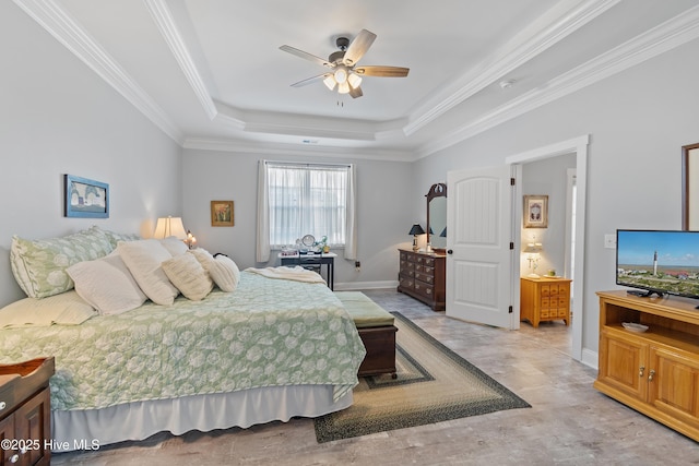2402 W Oak Island Dr, Oak Island, NC 28465 - bedroom with a tray ceiling, crown molding, baseboards, and ceiling fan