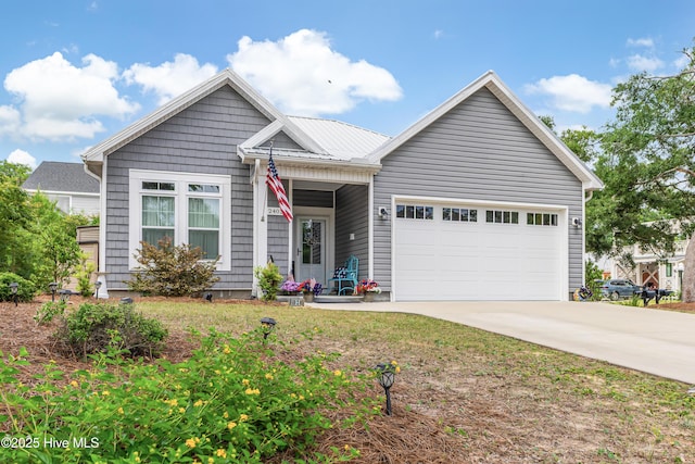 2402 W Oak Island Dr, Oak Island, NC 28465 - single story home featuring concrete driveway and an attached garage