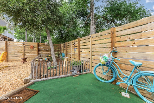 2402 W Oak Island Dr, Oak Island, NC 28465 - view of fenced backyard
