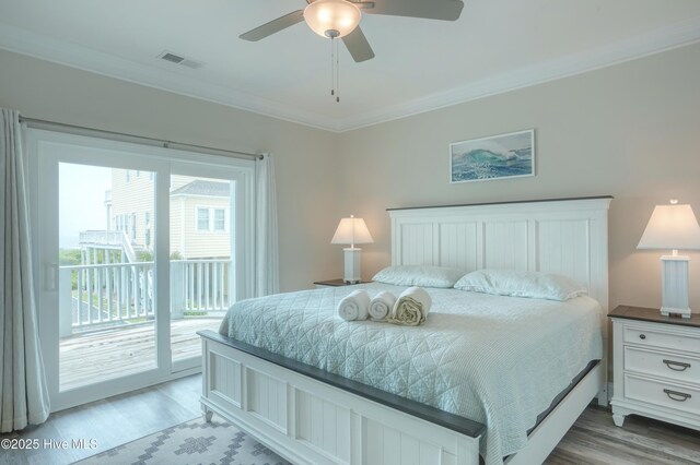 876 Villas Dr, North Topsail Beach, NC 28460 - bedroom with access to outside, crown molding, light wood-style floors, and ceiling fan